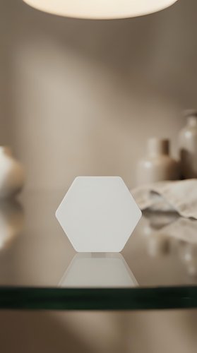 White hexagonal podium on reflective surface with warm neutral background for product display and branding presentations.
